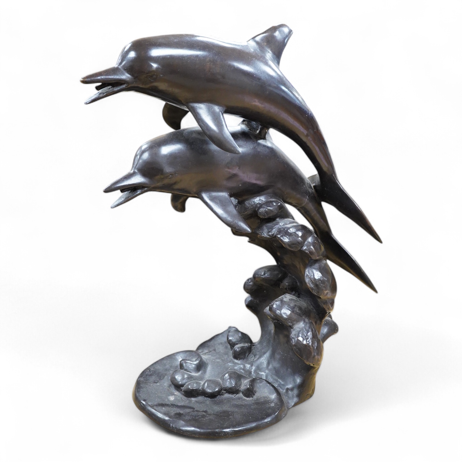 A large contemporary bronze dolphin fountain water feature, 61cm high
